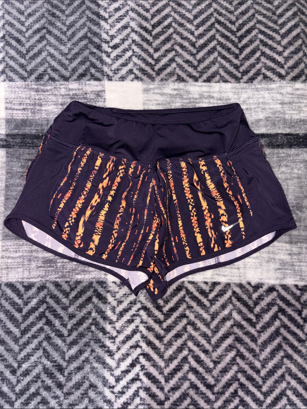 Nike Women’s Dark Blue Running Shorts with Orange Stripe Print